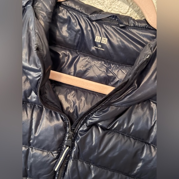 Uniqlo Ultra Light Down jacket in a glossy navy blue finish size XS in EUC - Picture 2 of 3